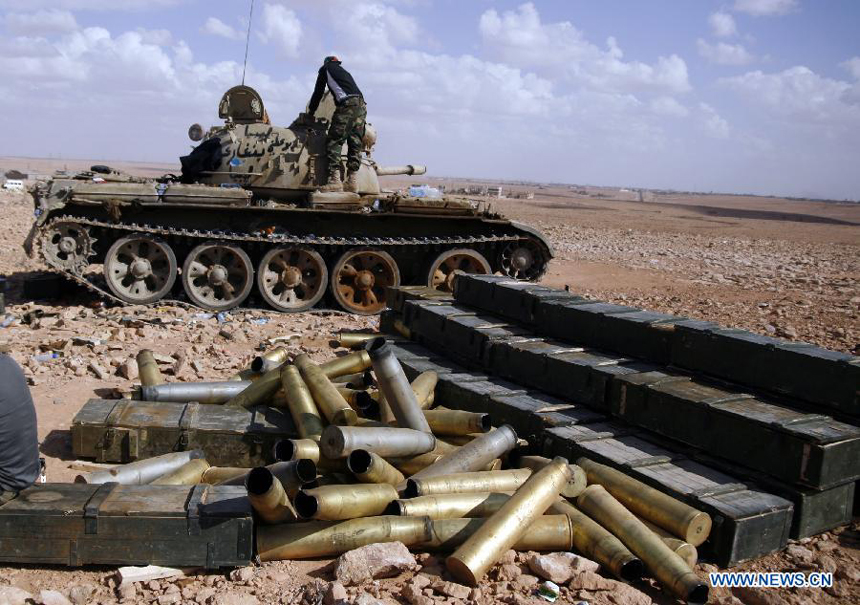 Forces of the Libyan National Transitional Council (NTC) make preparation for the fighting againt the fighters loyal to Muammar Gaddafi outside Bani Walid, Libya, Sept. 27, 2011. Bani Walid is still occupied by fighters loyal to Muammar Gaddafi.