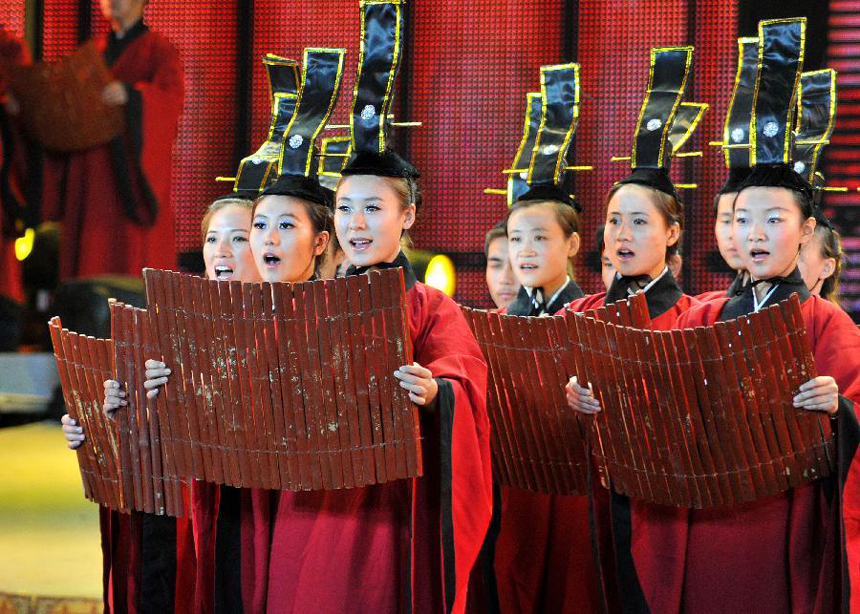 Actors perform during a dancing opera about Confucius (551-497BC), a Chinese thinker, educationist and philosopher, in Qufu, Confucius' hometown in east China's Shandong Province, Sept. 27, 2011.