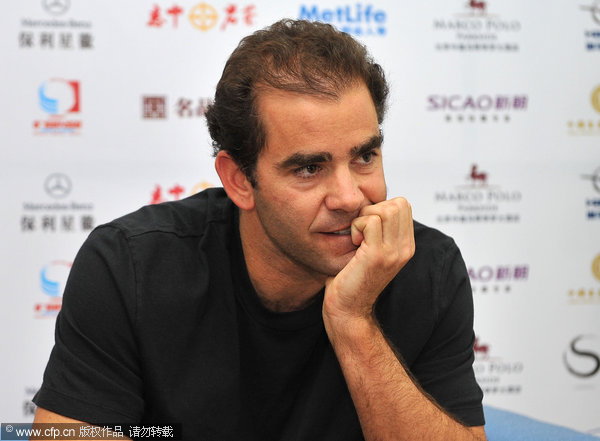 Pete Sampras at the press conference before China Open. He and Marat Safin will play the debut match at the new stadium of China Open on Friday to mark the opening of this tournament.