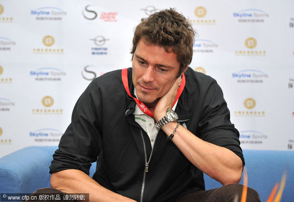 Marat Safin at the press conference. He and Pete Sampras will play the debut match at the new stadium of China Open on Friday to mark the opening of this tournament.