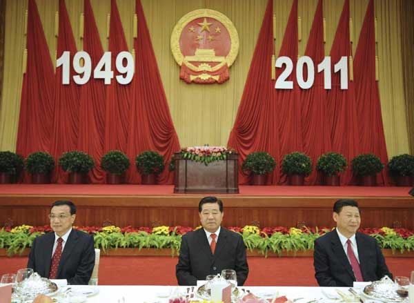 Jia Qinglin (C), chairman of the National Committee of the Chinese People's Political Consultative Conference (CPPCC), Chinese Vice President Xi Jinping (R) and Chinese Vice Premier Li Keqiang (L) attend a reception for the 62nd anniversary of the founding of the People's Republic of China in Beijing, capital of China, Sept. 29, 2011. 