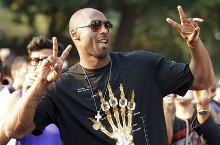 U.S. basketball star Kobe Bryant gestures during a sponsor's appearance in Milan, Italy on Wednesday, Sept. 28, 2011. 