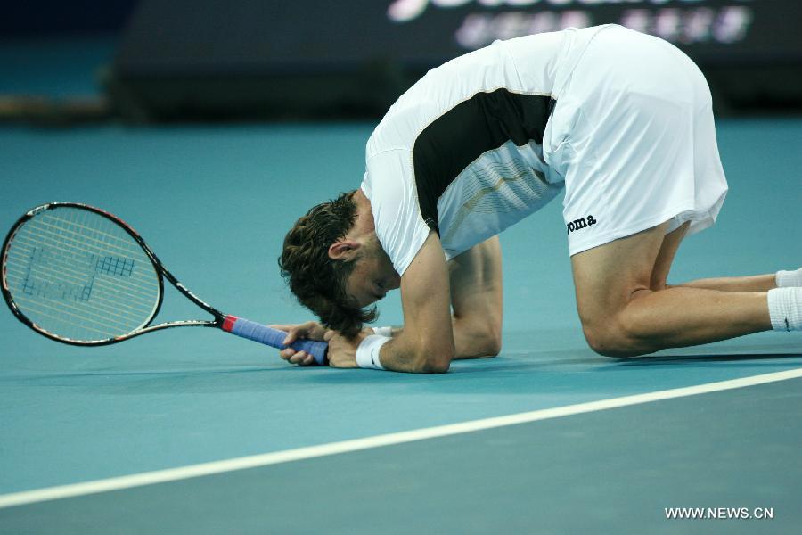 Spain's Juan Carlos Ferrero reacts during the men's singles quarterfinal against France's Jo-Wilfried Tsonga at 2011 China Open Tennis Tournament in Beijing, capital of China, on Oct. 7, 2011. Juan Carlos Ferrero lost the match 0-2. [Bai Xuefei/Xinhua]