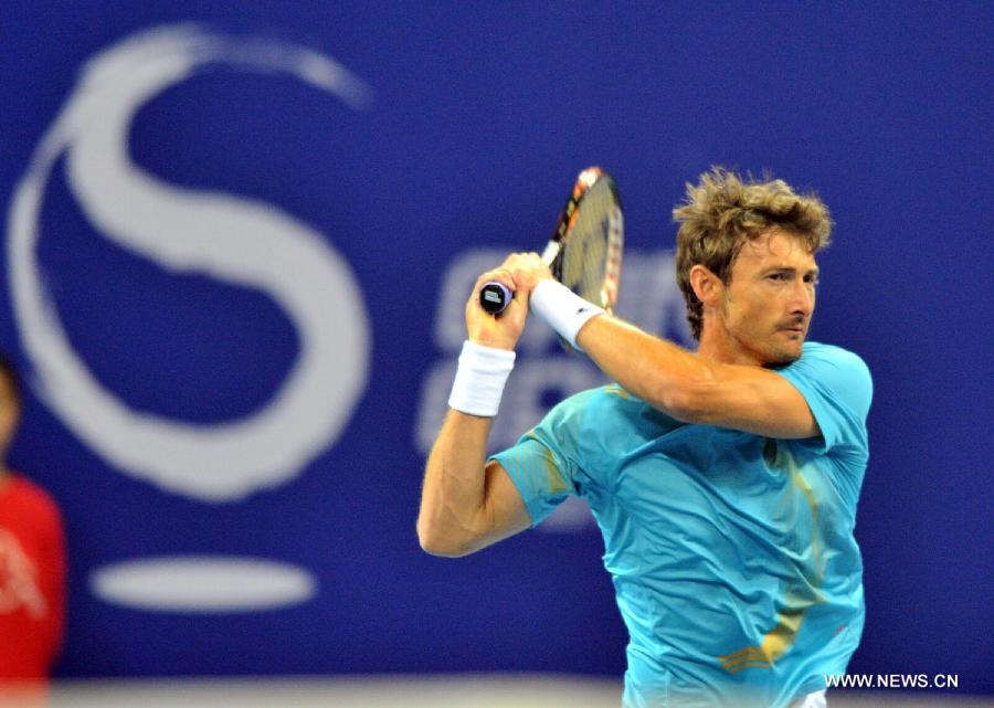 Spain's Juan Carlos Ferrero returns a shot during the men's singles quarterfinal against France's Jo-Wilfried Tsonga at 2011 China Open Tennis Tournament in Beijing, capital of China, on Oct. 7, 2011. Juan Carlos Ferrero lost the match 0-2. [Li Wen/Xinhua]