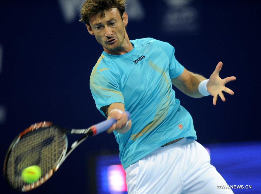 Spain's Juan Carlos Ferrero returns a shot during the men's singles quarterfinal against France's Jo-Wilfried Tsonga at 2011 China Open Tennis Tournament in Beijing, capital of China, on Oct. 7, 2011. Juan Carlos Ferrero lost the match 0-2. [Gong Lei/Xinhua]