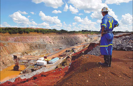 A mine supervisor overlooks Metorox's Chibuluma copper mine, near Kitwe, Zambia.