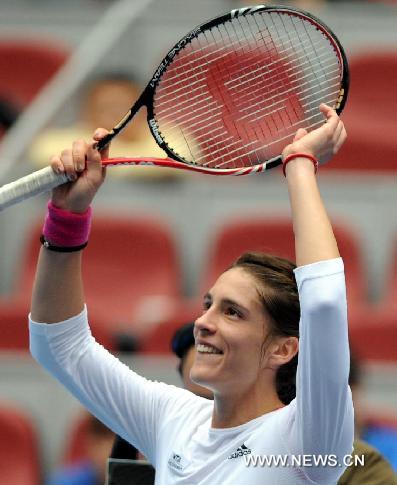 Andrea Petkovic of Germany celebrates after the semifinal of women's singles against Monica Niculescu of Romania at China Open Tennis Tournament in Beijing, China, Oct. 8, 2011. Petkovic won 2-0(6-2, 6-0). [Yang Shiyao/Xinhua]