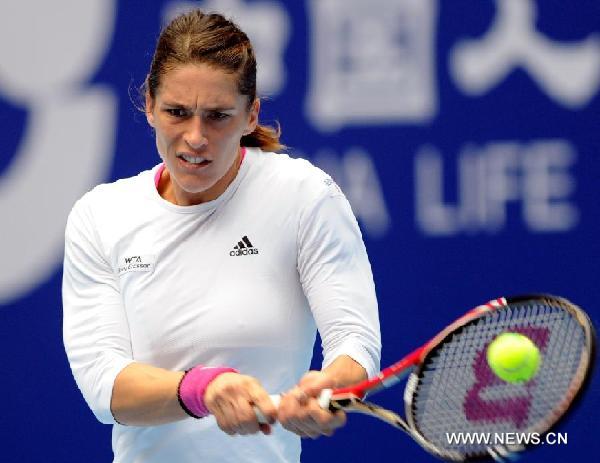 Andrea Petkovic of Germany returns the ball during the semifinal of women's singles against Monica Niculescu of Romania at China Open Tennis Tournament in Beijing, China, Oct. 8, 2011. Petkovic won 2-0(6-2, 6-0). [Xinhua]