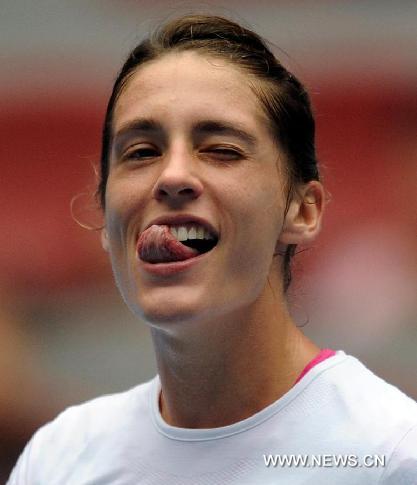 Andrea Petkovic of Germany reacts after the semifinal of women's singles against Monica Niculescu of Romania at China Open Tennis Tournament in Beijing, China, Oct. 8, 2011. Petkovic won 2-0(6-2, 6-0). [Gong Lei/Xinhua]
