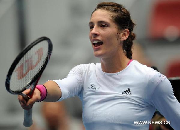 Andrea Petkovic of Germany celebrates after the semifinal of women's singles against Monica Niculescu of Romania at China Open Tennis Tournament in Beijing, China, Oct. 8, 2011. Petkovic won 2-0(6-2, 6-0). [Gong Lei/Xinhua]