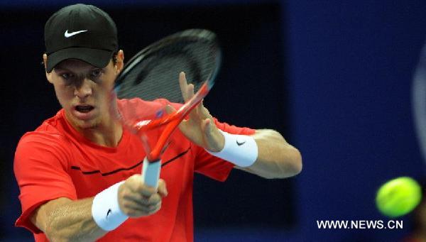 Tomas Berdych of Czech Republic returns the ball during the semifinal of men's singles against Jo-Wilfried Tsonga of France at China Open Tennis Tournament in Beijing, China, Oct. 8, 2011. Berdych won 2-1(6-4, 4-6, 6-1).