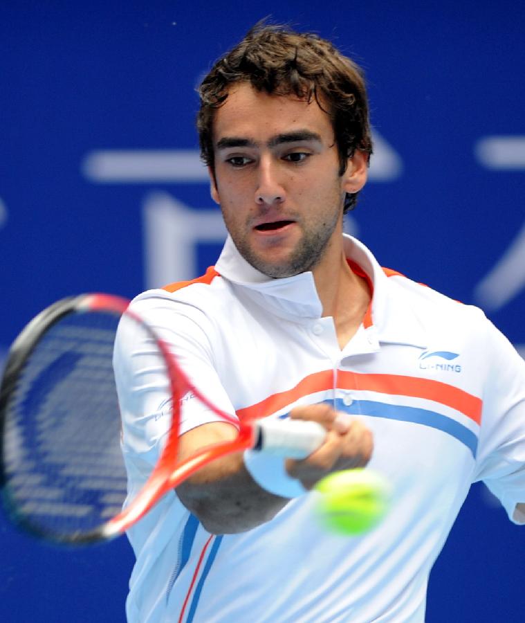 Croatia's Martin Cilic returns the ball to his compatriot Ivan Ljubicic during the men's singles semifinal at the 2011 China Open Tennis Tournament in Beijing, capital of China, on Oct. 8, 2011. Cilic entered the final after winning the match 2-0. [Yang Shiyao/Xinhua]