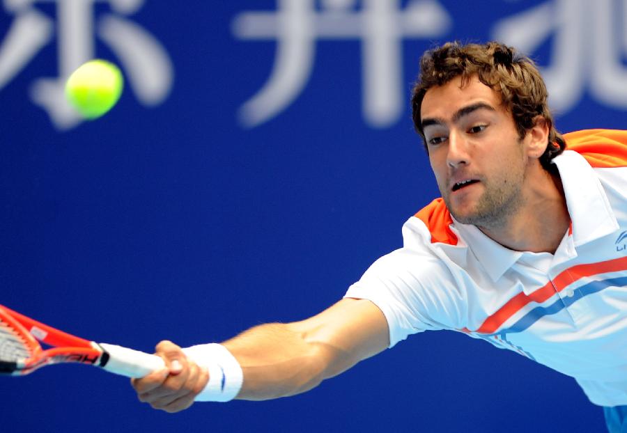 Croatia's Martin Cilic returns the ball to his compatriot Ivan Ljubicic during the men's singles semifinal at the 2011 China Open Tennis Tournament in Beijing, capital of China, on Oct. 8, 2011. Cilic entered the final after winning the match 2-0. [Yang Shiyao/Xinhua]