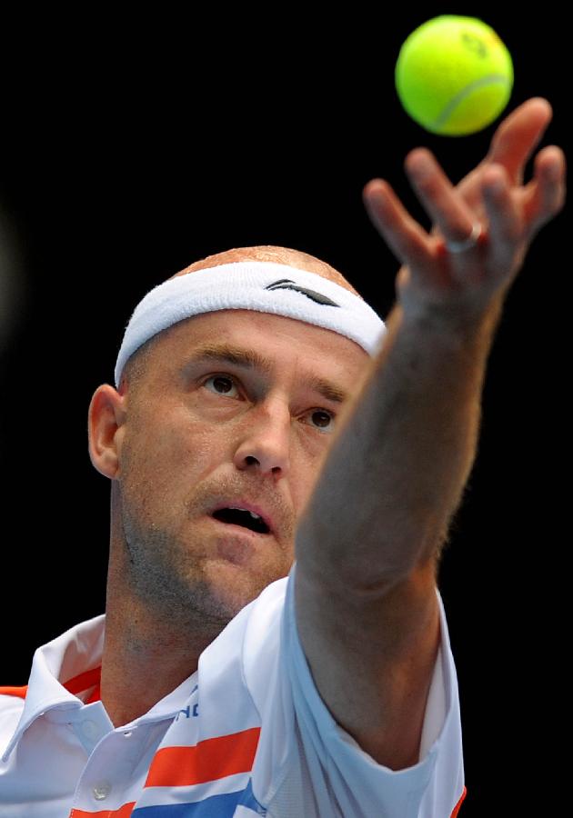 Croatia's Ivan Ljubicic serves to his compatriot Martin Cilic during the men's singles semifinal at the 2011 China Open Tennis Tournament in Beijing, capital of China, on Oct. 8, 2011. Ljubicic failed to enter the final after losing the match 0-2. [Gong Lei/Xinhua]
