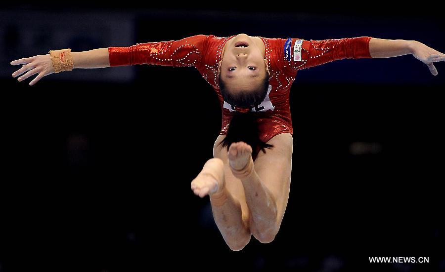 China's Yao Jinnan competes on the balance beam during the women's team qualifying round of the World Gymnastics Championships in Tokyo, capital of Japan, on Oct. 8, 2011. [Chen Xiaowei/Xinhua]