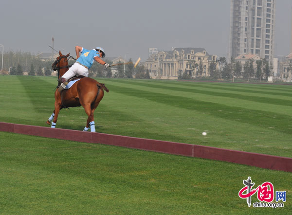 Argentina's Bautista Micheletti executes a skillful offside backhand in the semi-final against the USA at the Goldin U18 International Polo Tournament in Tianjin, Oct 5.