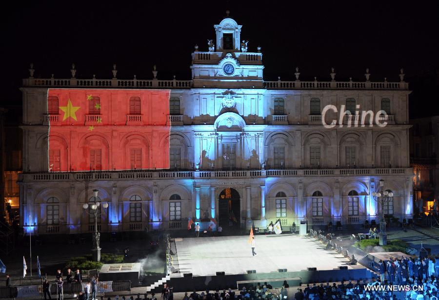 The national flag of China is seen during the opening ceremony for the 2011 World Fencing Championships in Catania, Italy, on Oct. 8, 2011. The event will last from Oct. 9 to 16. [Wang Qingqin/Xinhua]