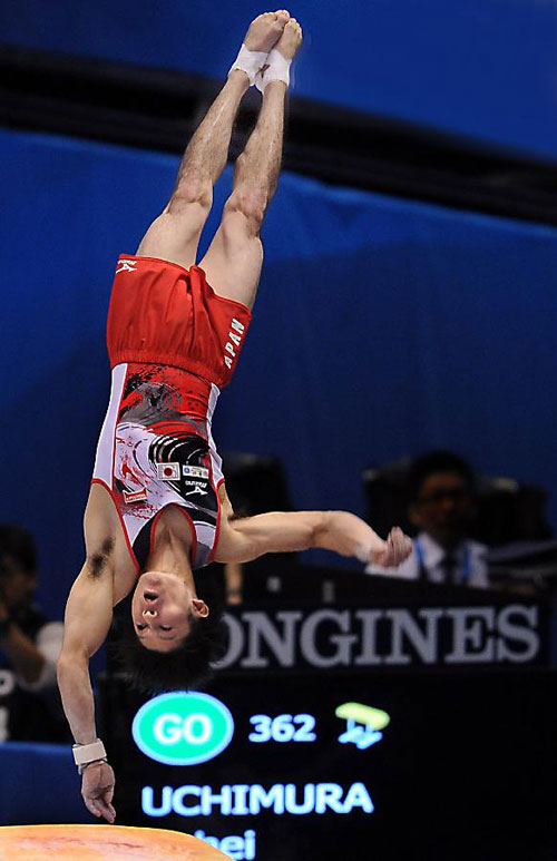 Kohei Uchimura of Japan performs on the vault during the men's qualification round of the World Gymnastics Championships 2011 in Tokyo, Japan, on Oct. 9, 2011. [Chen Xiaowei/Xinhua]