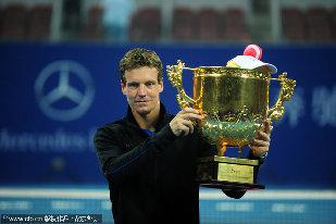 Czech Tomas Berdych celebrates with his trophy after defeating Croatian Marin Cilic in the men's singles final of the China Open Tennis Tournament at the national stadium in Beijing, Sunday, Oct. 9, 2011. Berdych battled back to defeat Marin Cilic 3-6, 6-4, 6-1.
