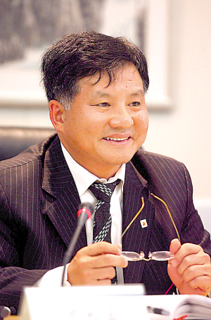 Shen Changfu, chairman and president of China Mobile's Chongqing branch