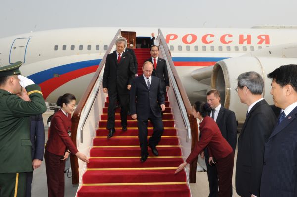 Russian Prime Minister Vladimir Putin arrives in Beijing for an official visit to China, Oct. 11, 2011. [Rao Aimin/Xinhua] 