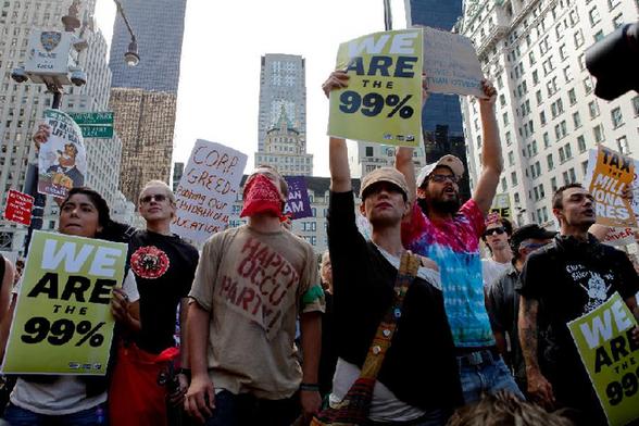 Members of the Occupy Wall Street movement protest on Grand Army Plaza, New York, the United States, Oct. 11, 2011. The Occupy Wall Street movement took protesters to the New York homes of super-wealthy executives on Tuesday. [Fan Xia/Xinhua]