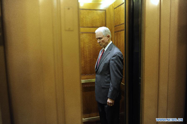U.S. Senator Jeff Sessions boards an elevator outside the Senate floor after voting the Currency Exchange Rate Oversight Reform Act on Capitol Hill in Washington D.C., capital of the United States, Oct. 11, 2011.