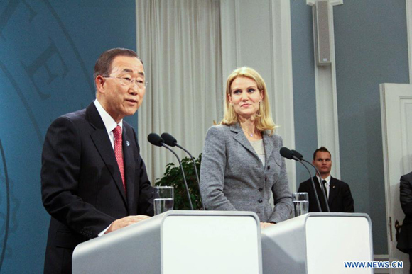 UN Secretary-General Ban Ki-Moon addresses journalists at a press conference with Danish Prime Minister Helle Thorning-Schmidt in Copenhagen, Denmark, Oct. 11, 2011. 