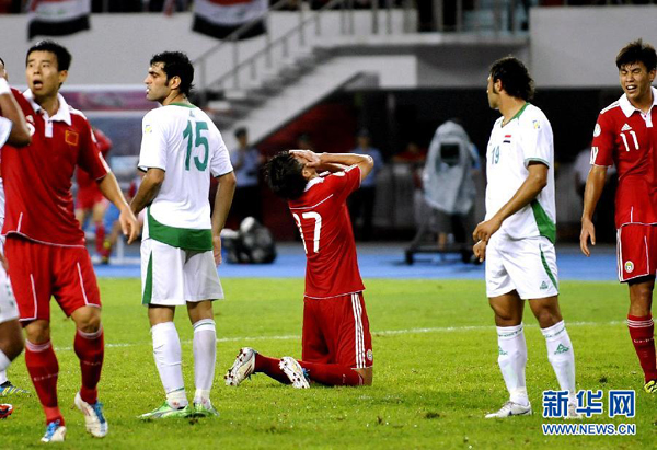 China's qualifying hopes for the 2014 Brazil World Cup became slim after a key home 1-0 loss to Iraqin Shenzhen on October 11, 2011.