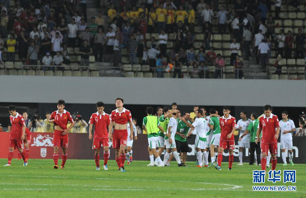 China's qualifying hopes for the 2014 Brazil World Cup became slim after a key home 1-0 loss to Iraqin Shenzhen on October 11, 2011.