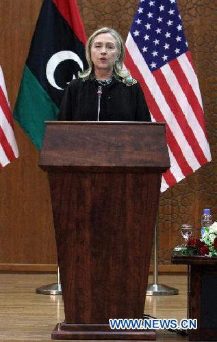 U.S. Secretary of State Hillary Clinton speaks at a press conference in Tripoli, Libya, on Oct. 18, 2011. [Hamza Turkia/Xinhua]