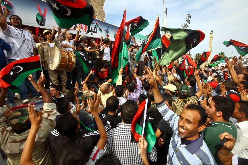 Jubilant Libyans celebrate the death of Col. Muammar Gaddafi in Tripoli, capital of Libya. [Xinhua]