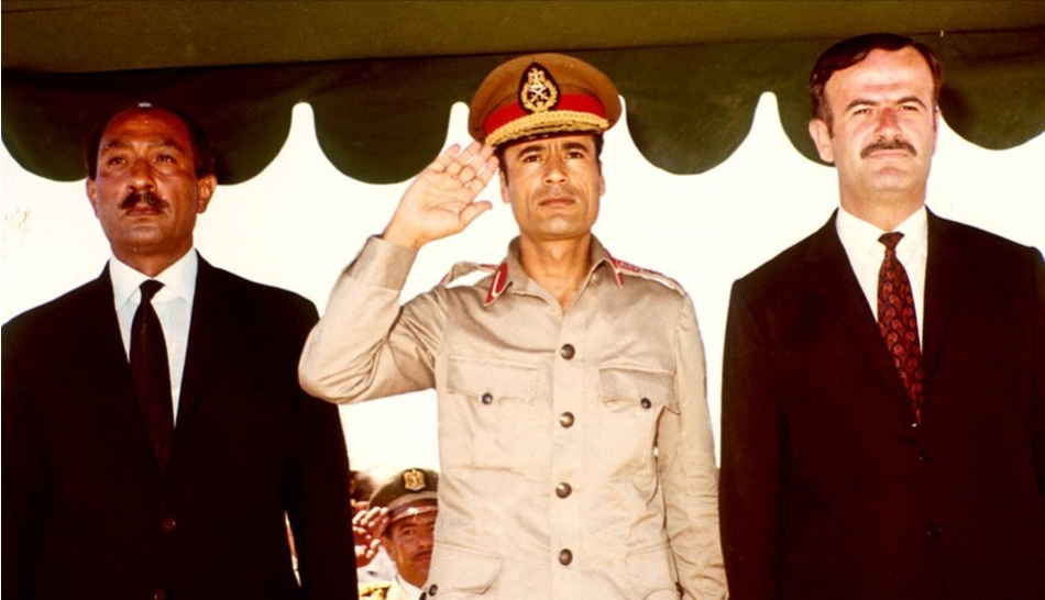 Former Libyan leader Muammar Gaddafi[Middle] when he is young 