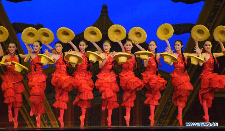 Acrobats perform during the 13th China Wuqiao International Circus Festival in Shijiazhuang, capital of north China's Hebei Province, Oct. 22, 2011. More than 200 acrobats from 17 countries and regions will take part in performance as well as competition during the nine-day festival which kicked off on Saturday. The festival is named after the province's Wuqiao County, the famous birthplace of acrobatics.