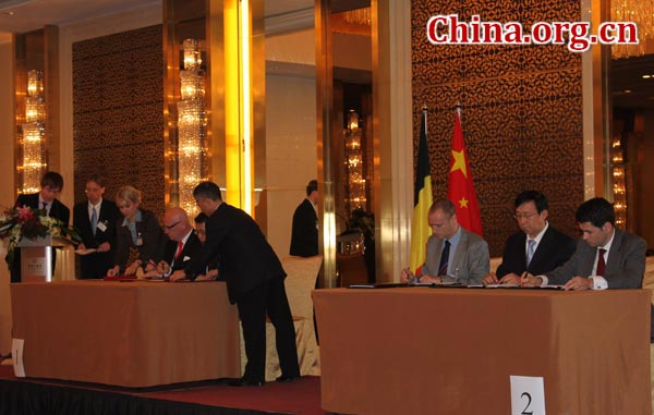 Belgian and Chinese private companies and public institutions signed a total of 23 contracts, agreements and MOU's in Beijing on Monday. [Wang Wei/China.org.cn]