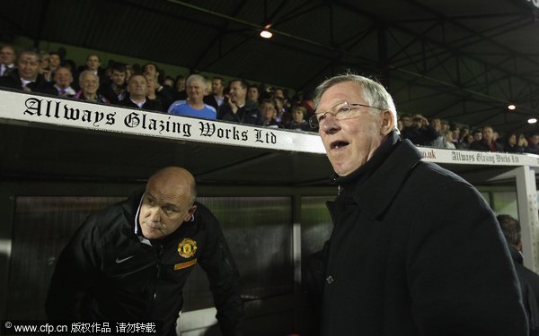 Sir Alex Ferguson looks on during the Carling Cup Fourth Round match between Aldershot Town and Manchester United at at the EBB Stadium, Recreation Ground on October 25, 2011 in Aldershot, England.