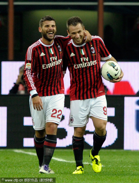 Antonio Nocerino and Antonio Cassano of AC Milan celebrate scoring the second goal during the Serie A match between AC Milan and Parma FC at Stadio Giuseppe Meazza on October 26, 2011 in Milan, Italy.
