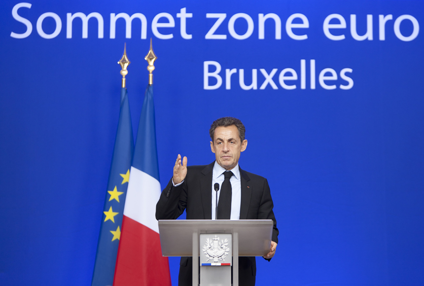 French President Nicolas Sarkozy attends a press conference after an EU summit in Brussels, capital of Belgium, on Oct. 27, 2011. European leaders announced early Thursday morning that a long-awaited rescue plan to fight the euro debt crisis has been reached, which included a 50 percent writedown on the value of the Greek bonds held by private investors.