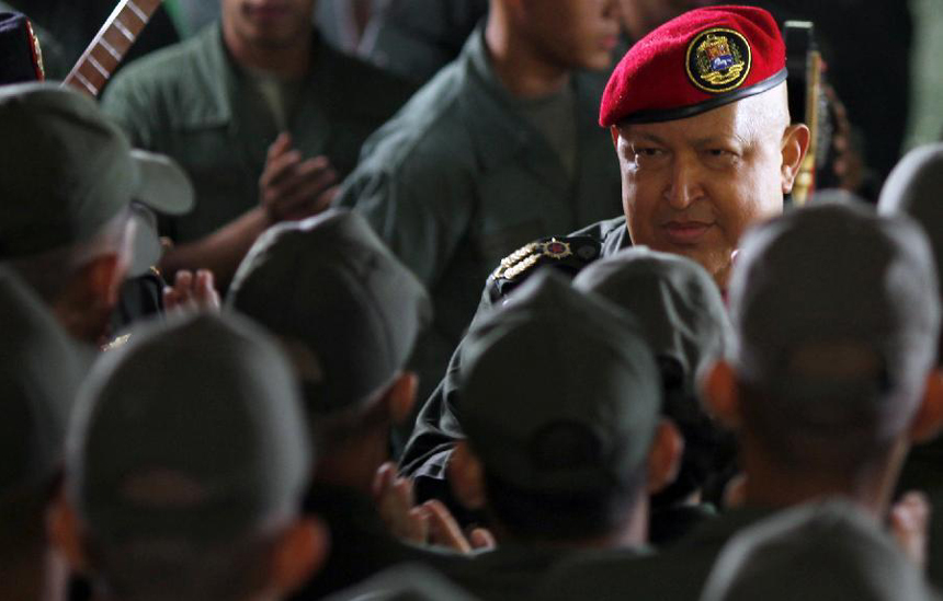 Image provided by Venezuelan Presidency shows President Hugo Chavez greeting the cadets of the Venezuela National Armed Forces, at Tiuna Fort, in Caracas, capital of Venezuela, on Oct. 26, 2011. 