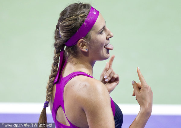 Victoria Azarenka of Belarus celebrates after defeating China's Li Na during the WTA Tennis Championship finals in Istanbul, Turkey on Thursday, Oct. 27, 2011.
