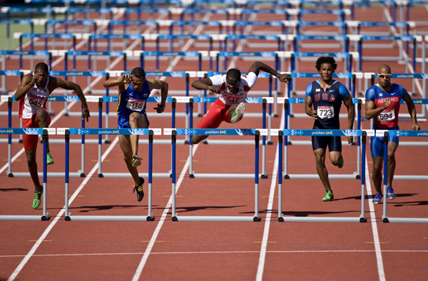 Athletes compete in the men's 110m hurdles final competition during the Pan American Games Guadalajara 2011, at Telmex Athletics Stadium, in Zapopan, Jalisco, Mexico, on Oct. 28, 2011. [Guillermo Arias/Xinhua]