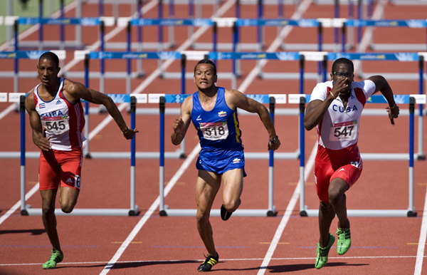 Dayron Robles (R) of Cuba, Paulo Cesar Villar (C) of Colombia and Orlando Ortega of Cuba compete in the men's 110m hurdles final competition during the Pan American Games Guadalajara 2011, at Telmex Athletics Stadium, in Zapopan, Jalisco, Mexico, on Oct. 28, 2011. [Guillermo Arias/Xinhua] 