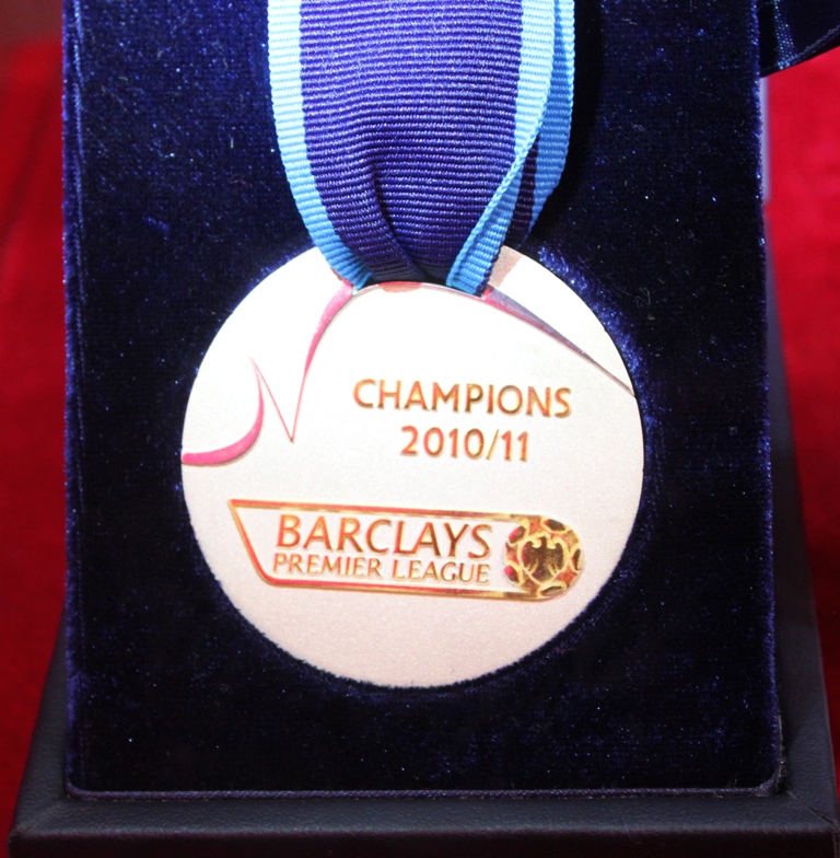  Champions medal exhibited at the Barclays Premier League Trophy Tour in Beijing on Sunday, October 30. [Source:China.org.cn]