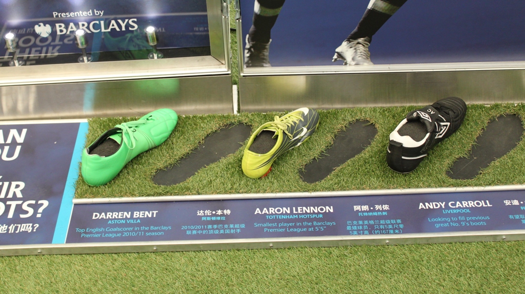 Shoes of Darren Bent, Arron Lennon and Andy Carroll exhibited at the Barclays Premier League Trophy Tour in Beijing on Sunday, October 30. [Source:China.org.cn]