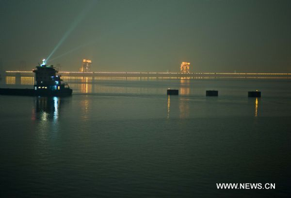 Photo taken on Oct. 30, 2011 shows the Three Gorges Dam, in Yichang, central China's Hubei Province. The water level of the Three Gorges Dam, the world's largest water control and hydropower project which spans China's Yangtze River, reached its designed full capacity of 175 meters on Sunday. (Xinhua/Xiao Yijiu) (cxy) 