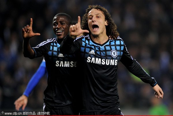 Ramires of Chelsea celebrates scoring the opening goal with team mate David Luiz (R) during the UEFA Champions League Group E match between KRC Genk and Chelsea at the KRC Genk Arena on November 1, 2011 in Genk, Belgium.