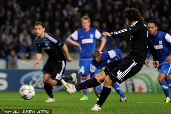  David Luiz of Chelsea takes and subsequently misses a penalty kick during the UEFA Champions League Group E match between KRC Genk and Chelsea at the KRC Genk Arena on November 1, 2011 in Genk, Belgium. 