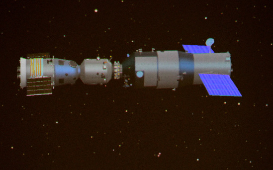 A simulated computer image of the spacecraft after Shenzhou 8 successfully docks with Tiangong 1. [Xinhua]