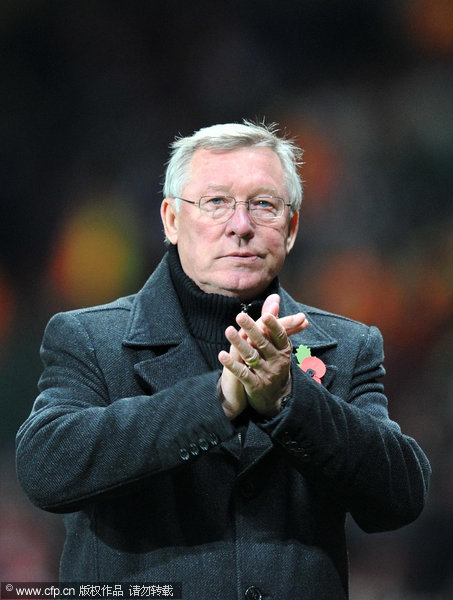 Manchester United manager Alex Ferguson leaves the pitch after the UEFA Champions League match at Old Trafford, Manchester.