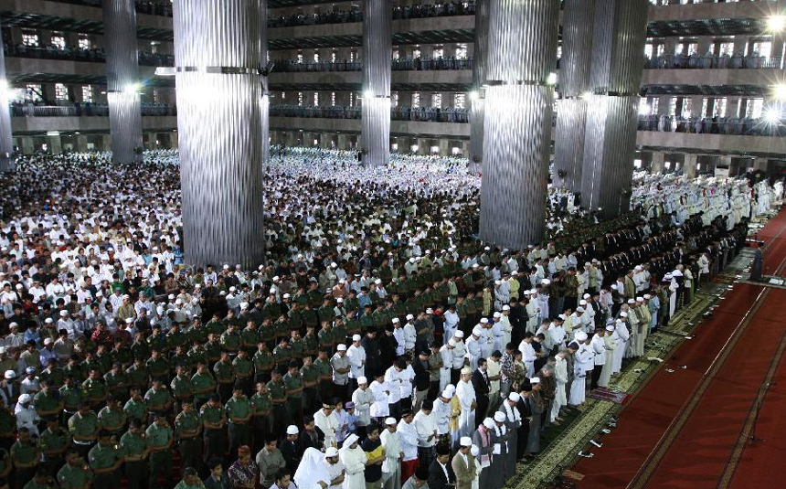 Thousands of Muslims pray for Eid al-Adha at the Istiqlal Mosque in Jakarta, Indonesia, Nov. 6, 2011. Muslims celebrate Eid al-Adha, also known as the Corban Festival which falls on the 10th day of the 12th month of the Islamic calendar, to mark the end of the hajj and commemorate Prophet Abraham's willingness to sacrifice his son Ismail on God's command.